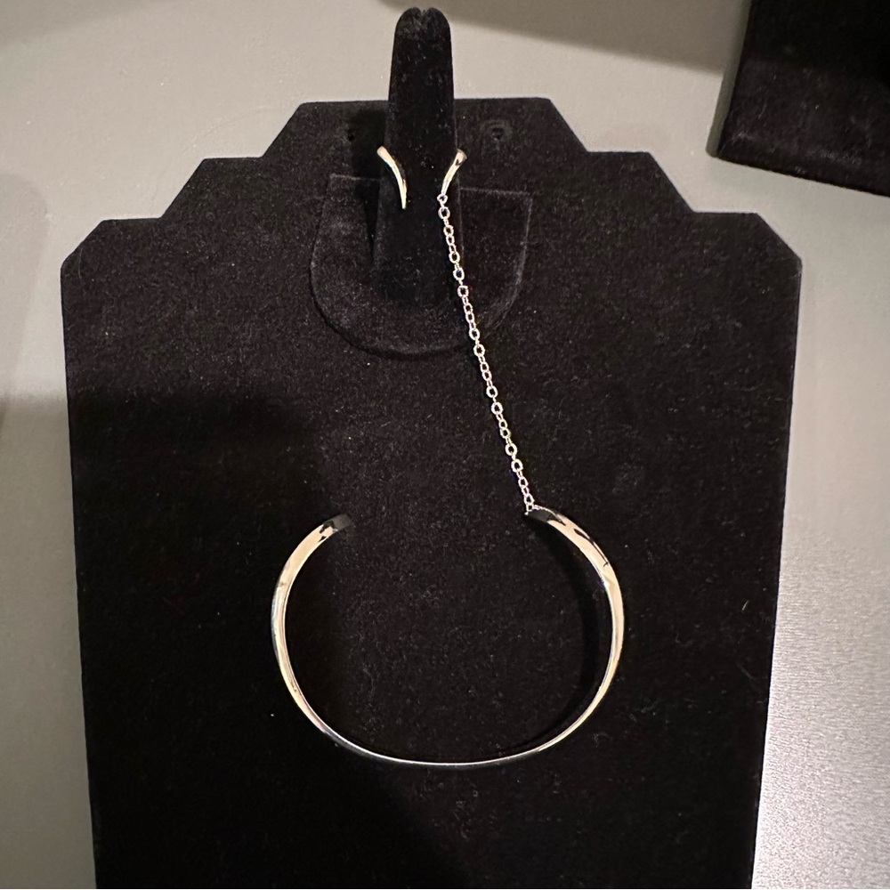 Noir NYC Jewelry Silver Open Cuff Bracelet with Chain connected to Ring